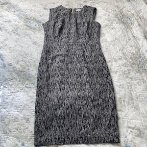 Calvin Klein size 6 work dress with gold zipper up the back.